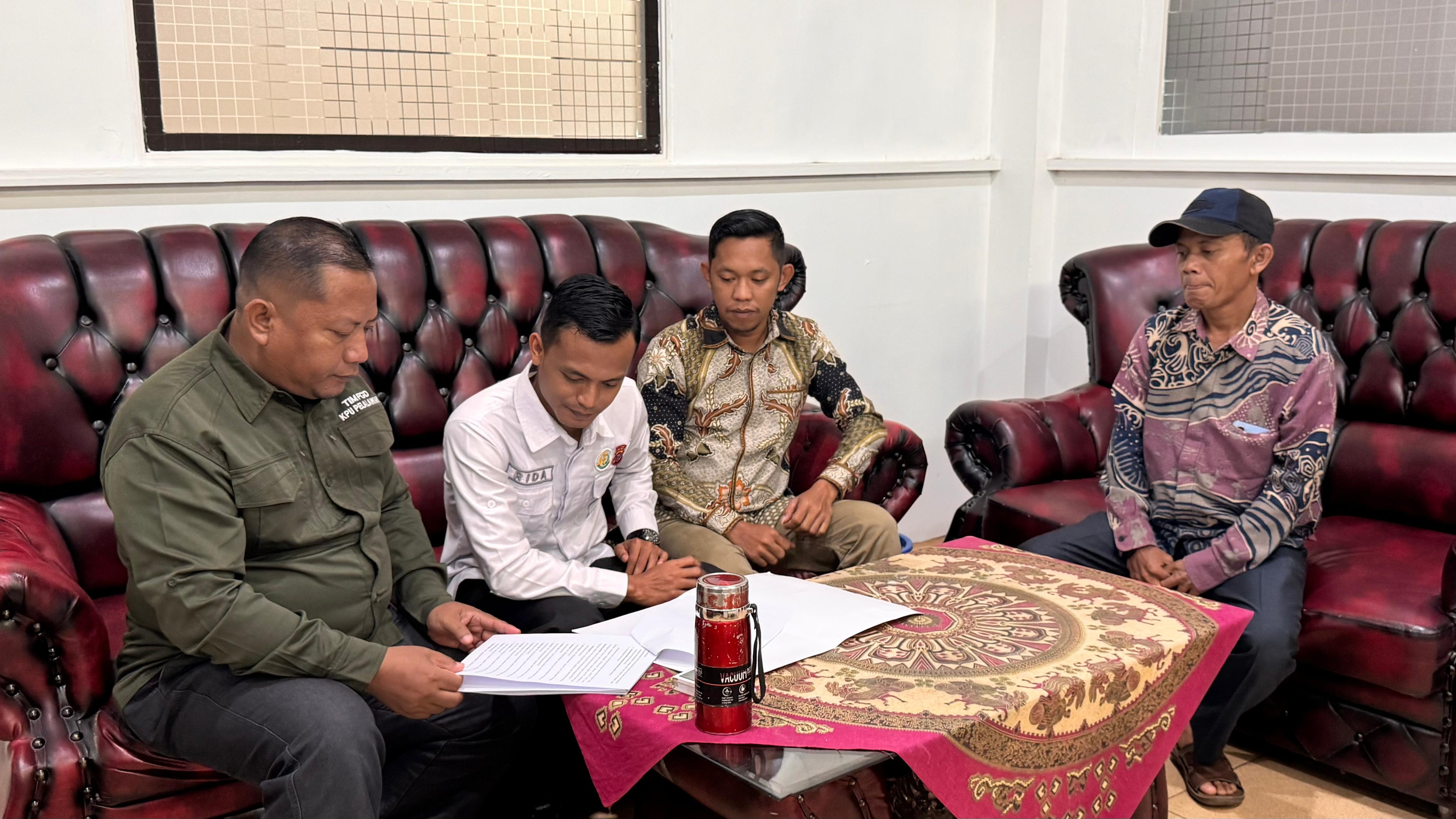 Rida dan KPU Pelalawan