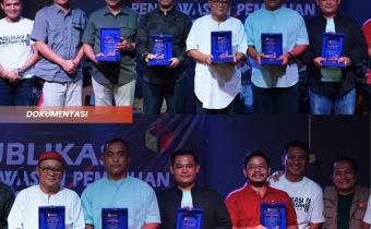 plakat penghargaan pilkada pelalawan aman dan damai